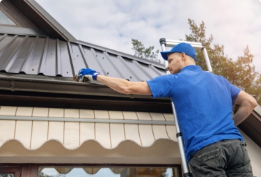Worker repairing roof top