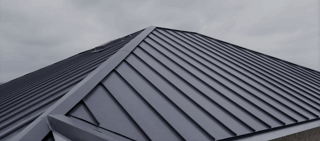 Contractor applying modern roof restoration coating