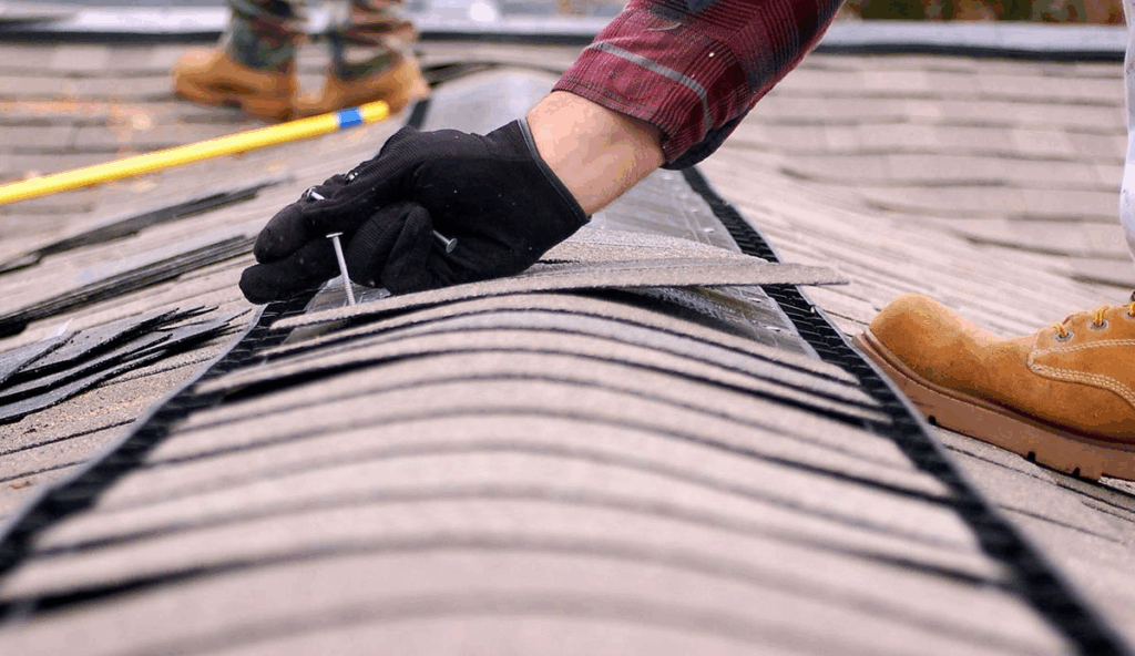 Roofing and restoration specialist repairing storm damage