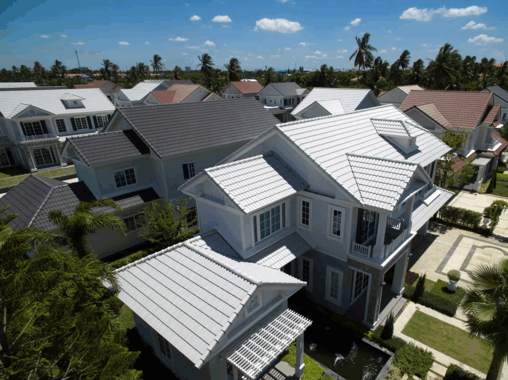 Tile roof restoration experts repairing damaged tiles