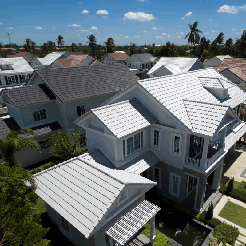 Tile roof restoration experts repairing damaged tiles